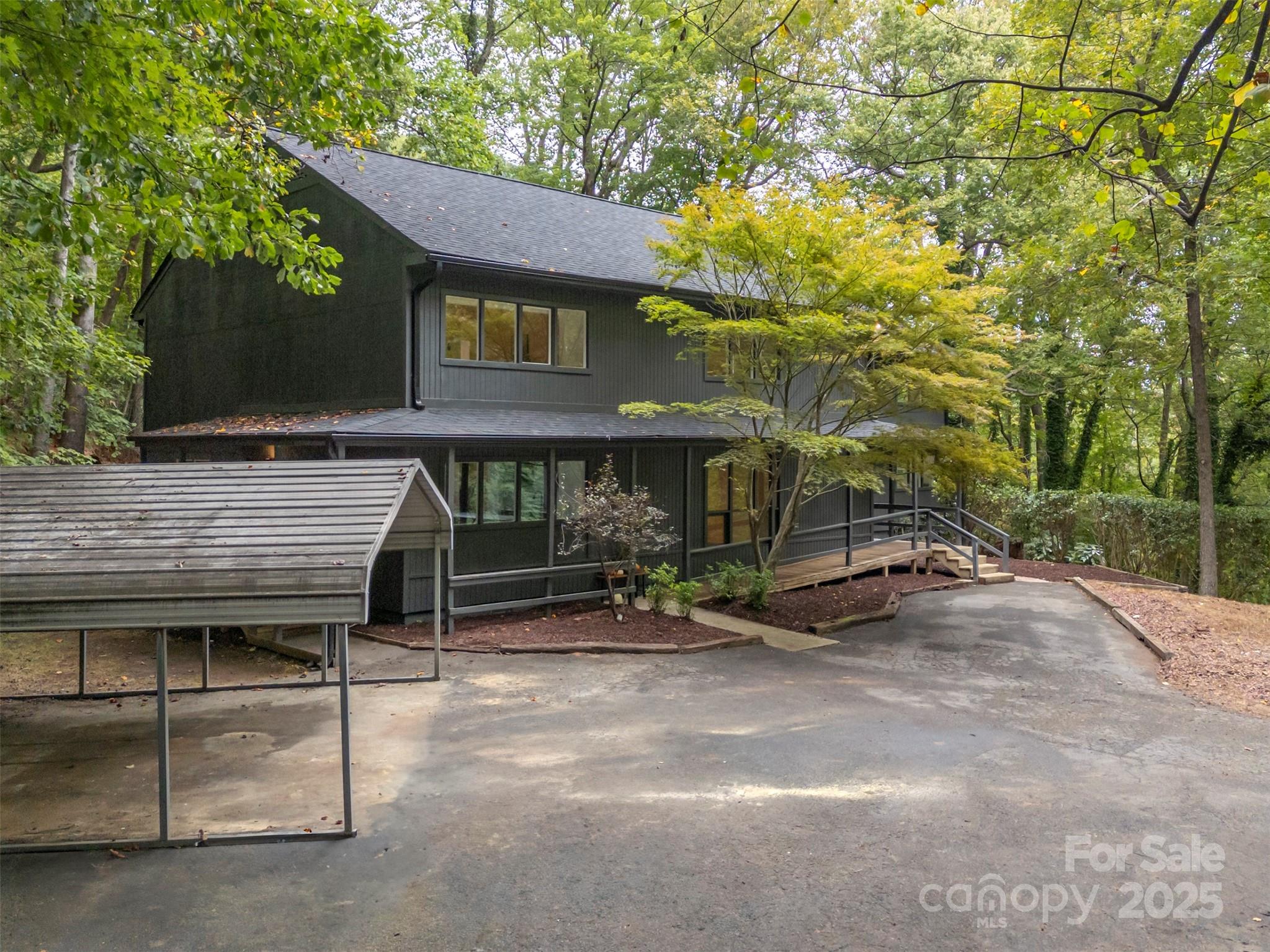 160 Lasae Lane Tryon, NC 28782 - Photo 46 of 48 a view of a house with a patio