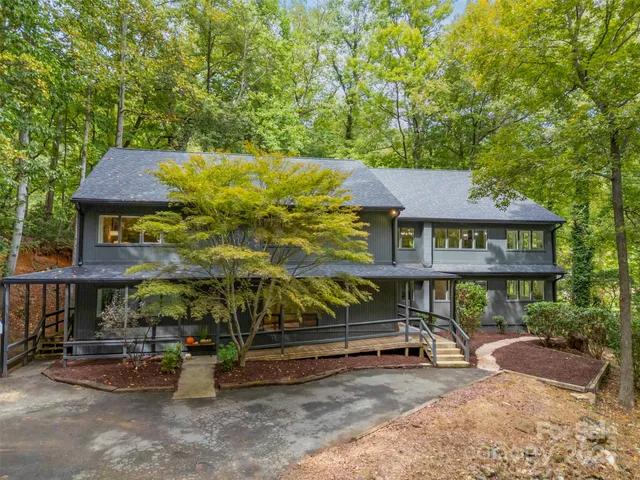 a balcony with view of an outdoor space