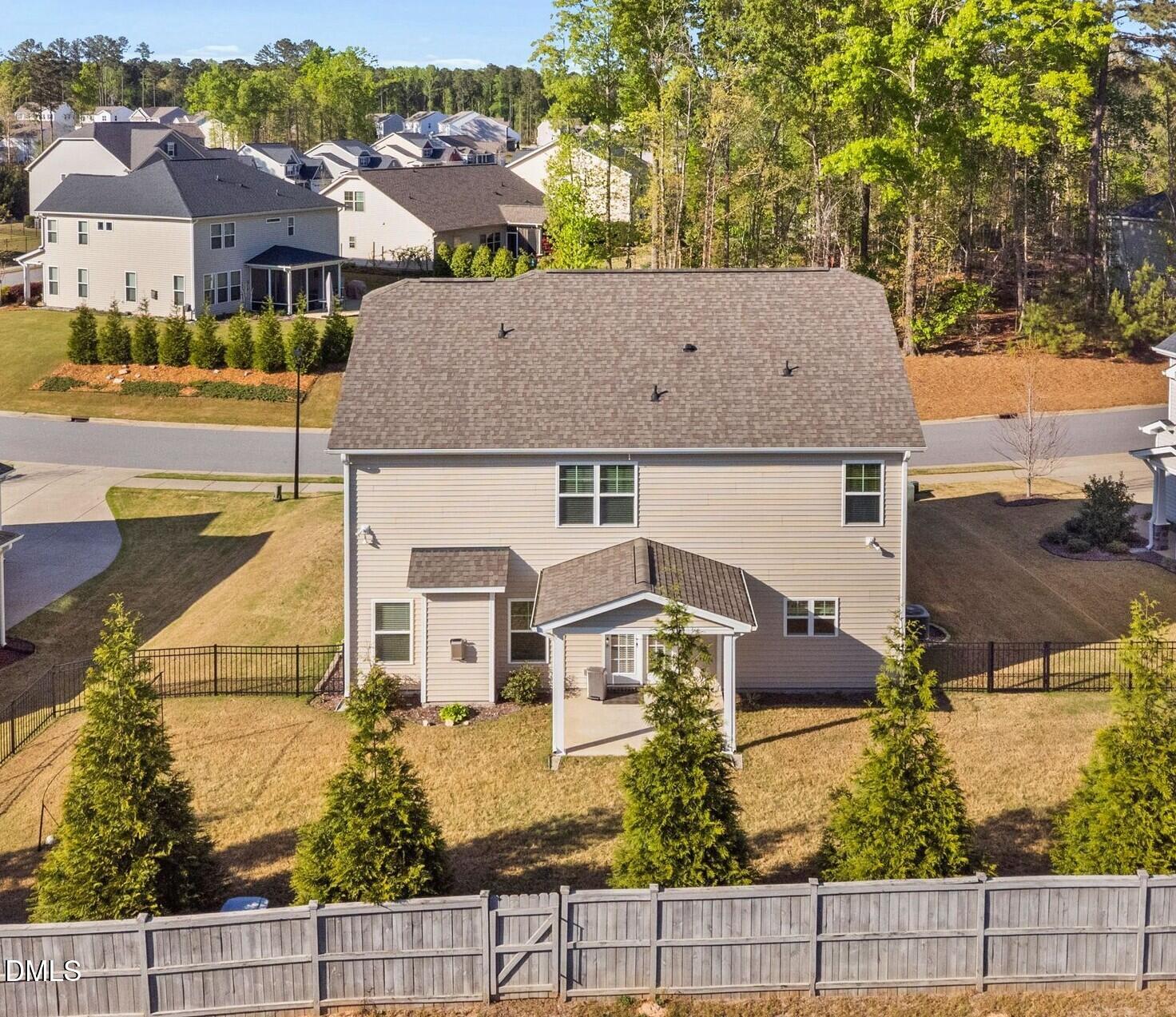 164 East Ravano Drive Clayton, NC 27527 - Photo 24 of 30 an aerial view of a house with a yard