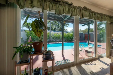 a view of yard with patio