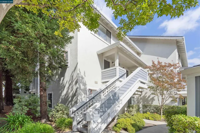 a house with trees in front of it