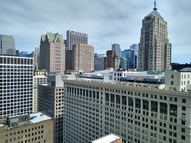 a view of city with tall buildings