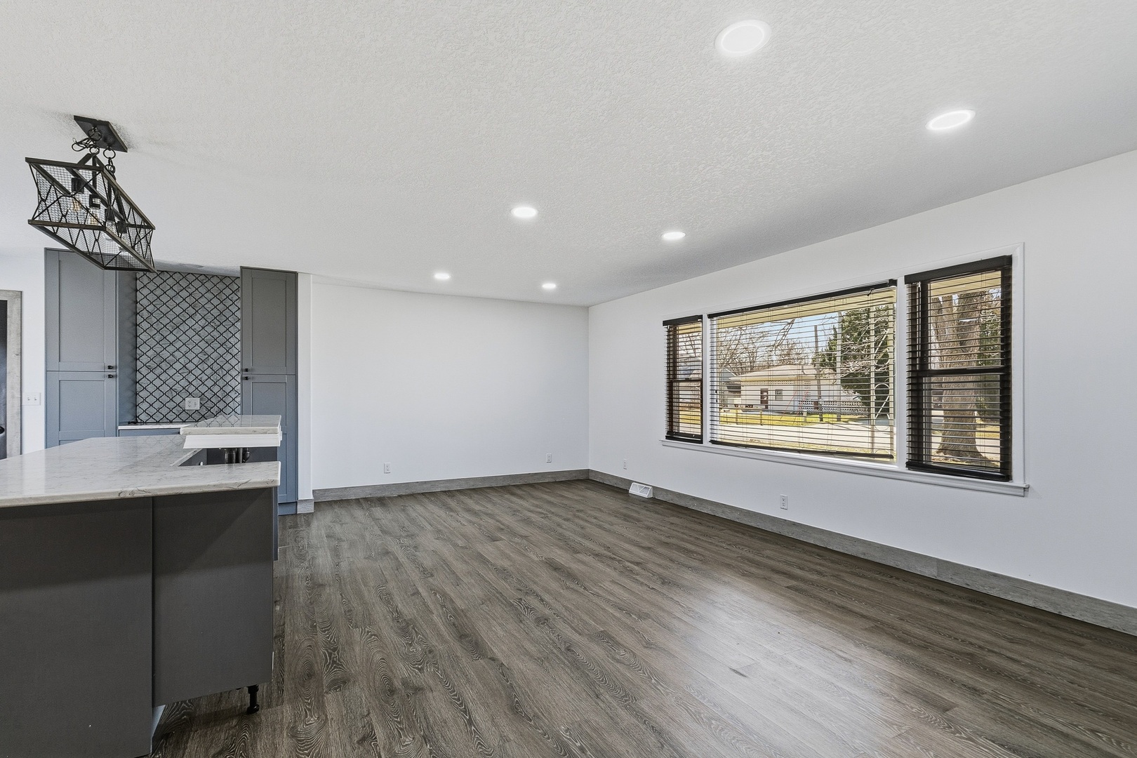 11622 27th Street West Milan, IL 61264 - Photo 13 of 49 a view of room with window and wooden floor