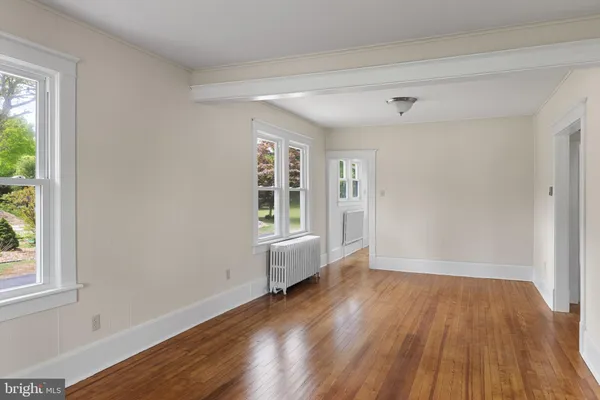a view of livingroom with hardwood floor and window