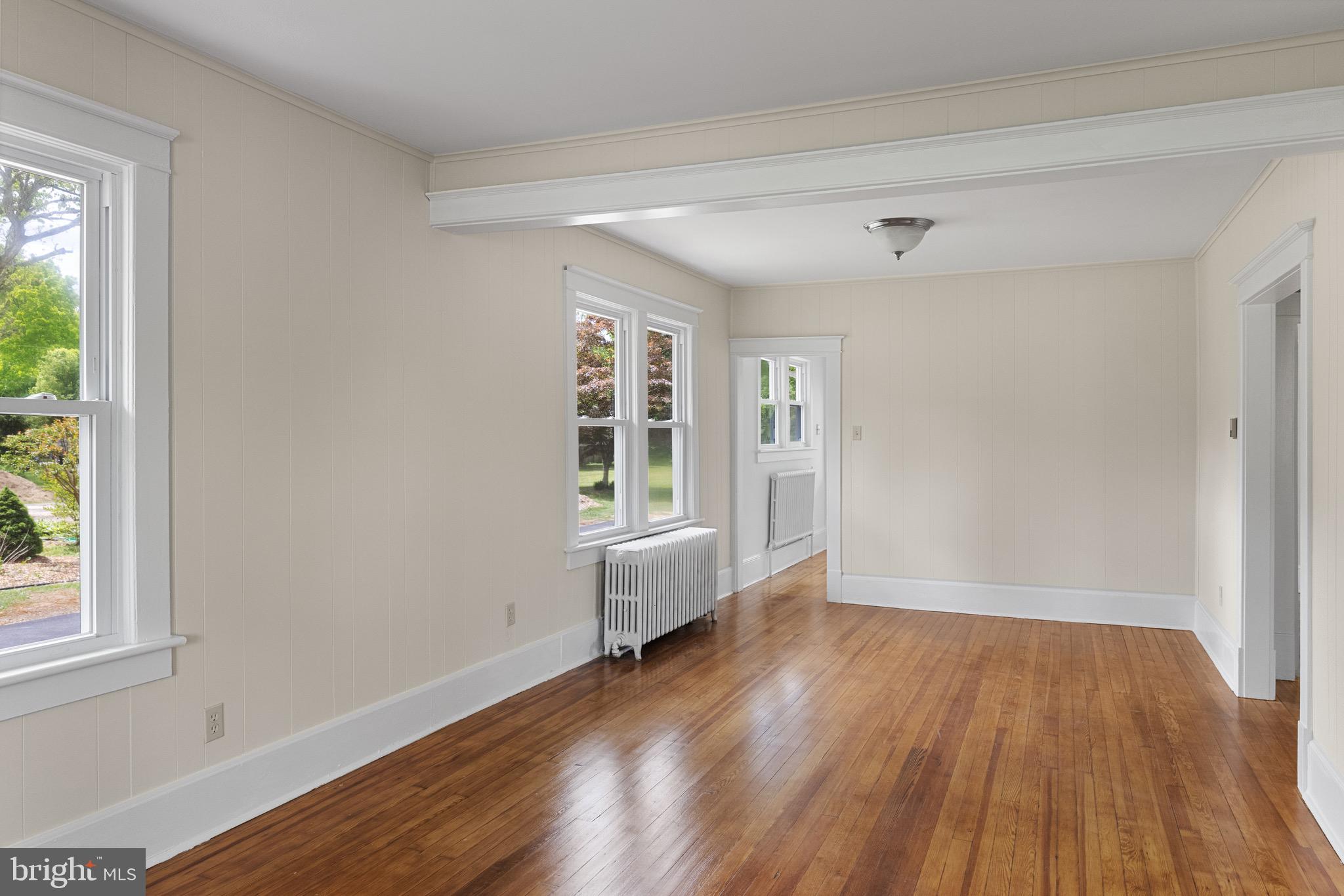 1842 South Spring Road Vineland, NJ 08361 - Photo 8 of 22 a view of livingroom with hardwood floor and window