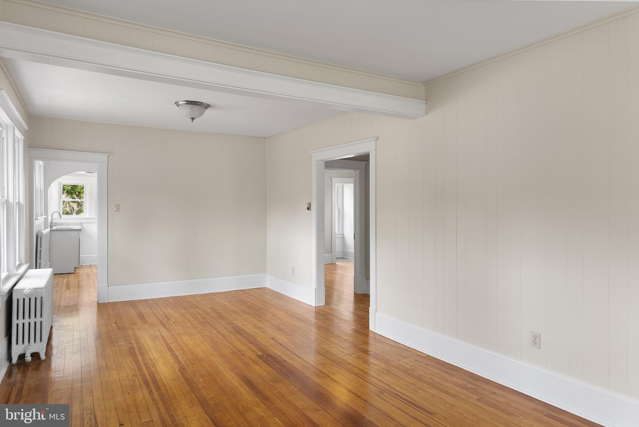 1842 South Spring Road Vineland, NJ 08361 - Photo 9 of 22 a view of an empty room with wooden floor