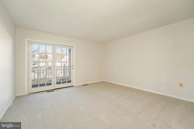 an empty room with a natural light