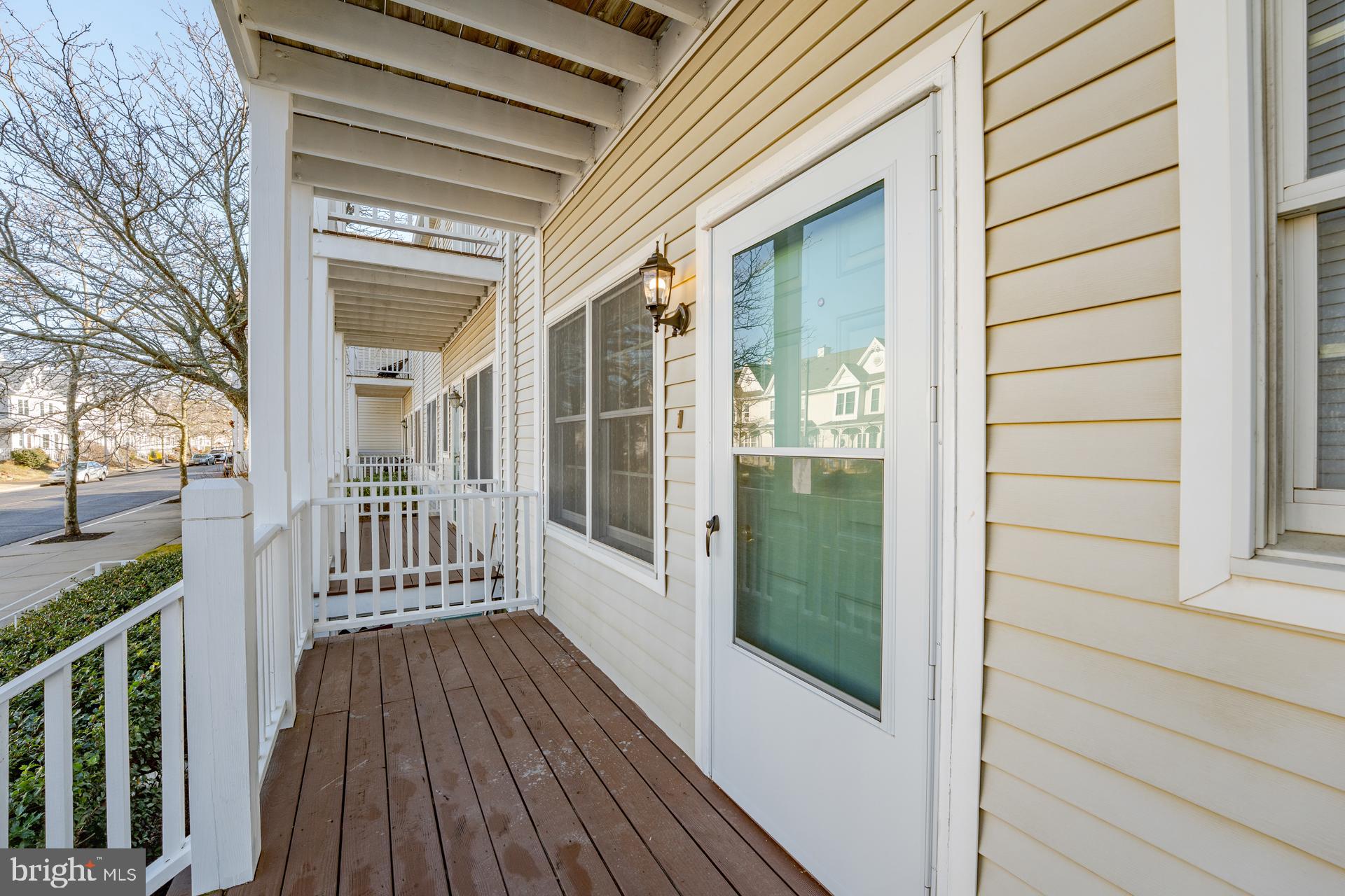 19 Clipper Court Atlantic City, NJ 08401 - Photo 2 of 35 a view of a porch with wooden floor and fence