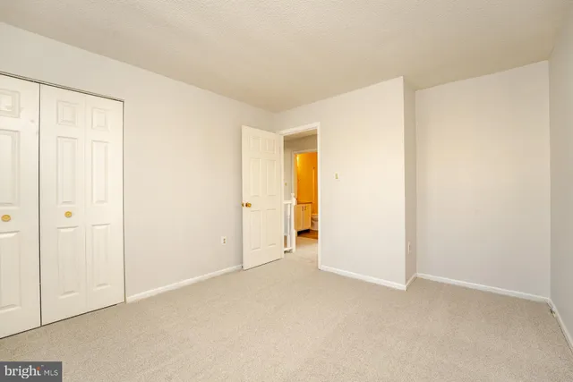 a view of a wooden house with a large window