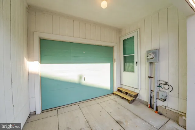 a view of a brick house with a yard