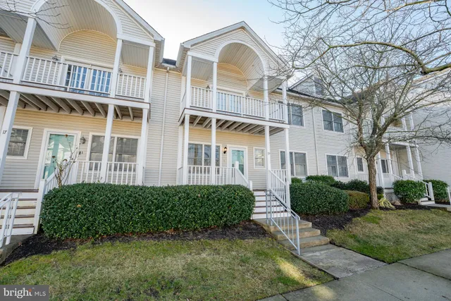 a view of a balcony with wooden floor