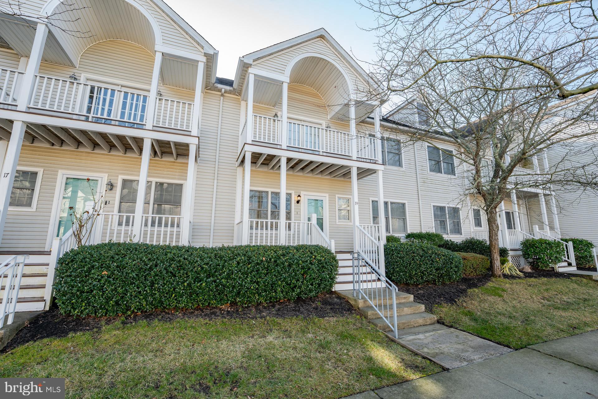 19 Clipper Court Atlantic City, NJ 08401 - Photo 31 of 35 a view of a brick house with a yard