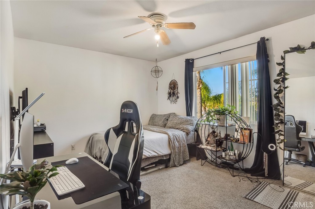 4330 Forest Ranch Way Oceanside, CA 92057 - Photo 26 of 51 Each secondary bedroom upstairs offers more than just space, they offer endless possibilities. With large windows that bring in soft natural light, these rooms feel open, comfortable, and full of potential.