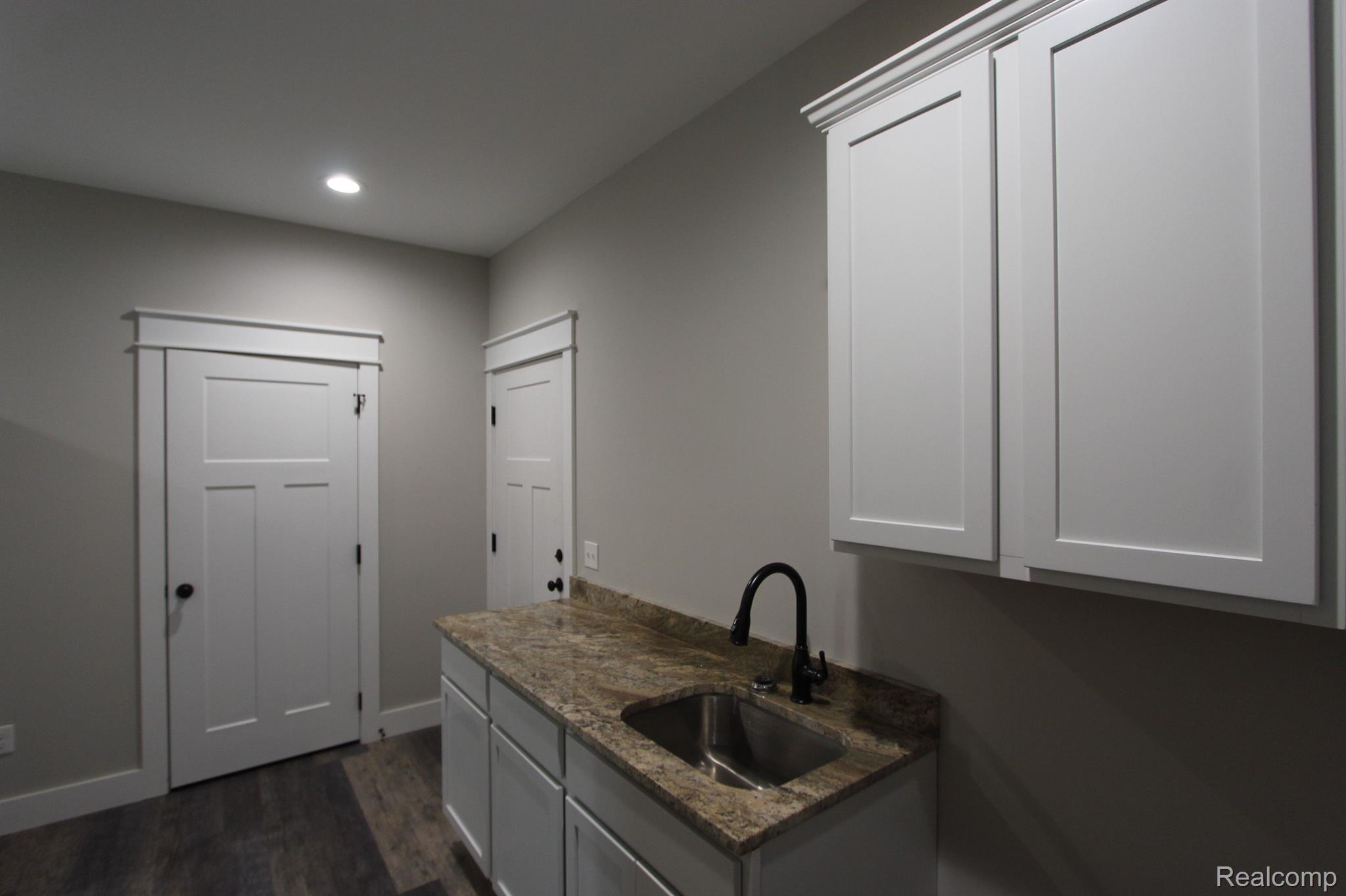 2975 East Coon Lake Road Howell, MI 48843 - Photo 59 of 175 LAUNDRY ROOM