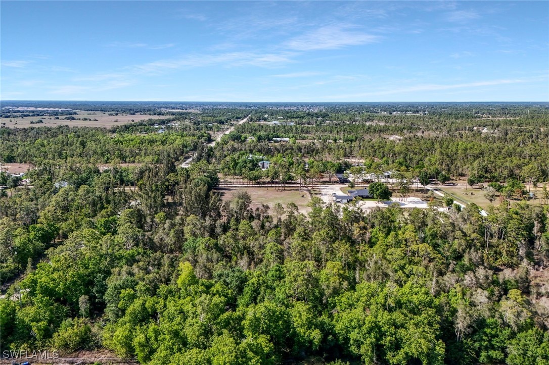 12571 Shawnee Road Fort Myers, FL 33913 - Photo 13 of 15 an aerial view of multiple house