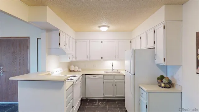 a bathroom with a sink a mirror and a shower