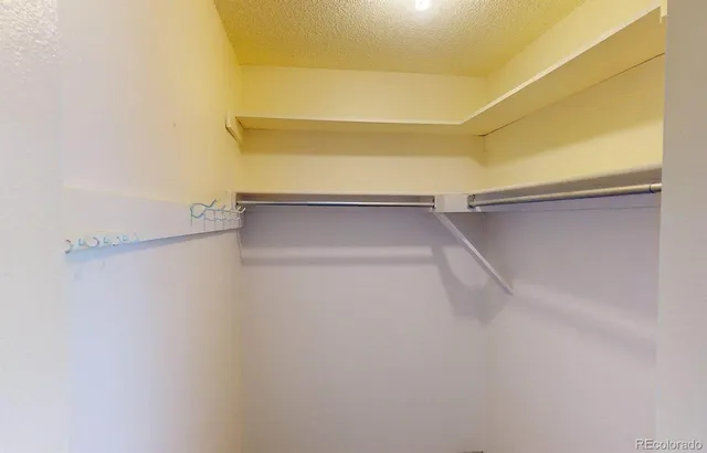 a swimming pool with outdoor seating and yard