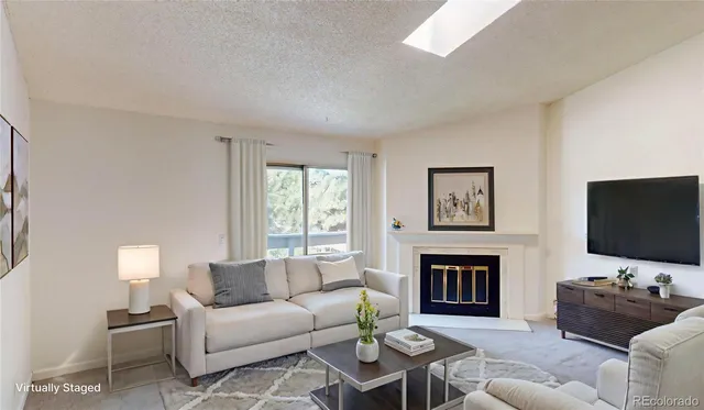 a view of a hallway with paintings on the wall