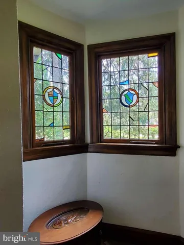 a view of a window in an empty room