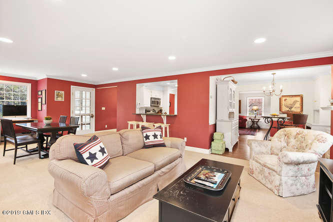 42 Indian Field Road Greenwich, CT 06830 - Photo 14 of 43 a living room with furniture and a large window