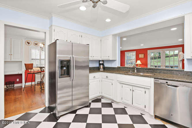 42 Indian Field Road Greenwich, CT 06830 - Photo 17 of 43 a kitchen with granite countertop stainless steel appliances a sink and counter space