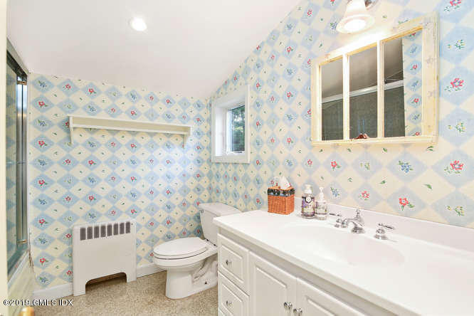 42 Indian Field Road Greenwich, CT 06830 - Photo 30 of 43 a bathroom with a sink toilet and shower