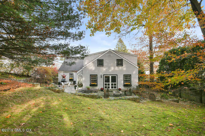 42 Indian Field Road Greenwich, CT 06830 - Photo 38 of 43 a front view of a house with garden