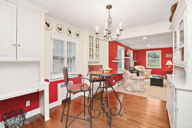 42 Indian Field Road Greenwich, CT 06830 - Photo 8 of 43 a view of a dining room with furniture window and wooden floor