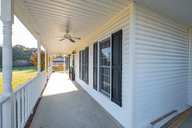 a view of a golf course with a lake view