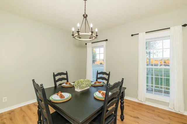 a bathroom with a shower and a mirror