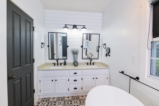 a view of a hallway with a window