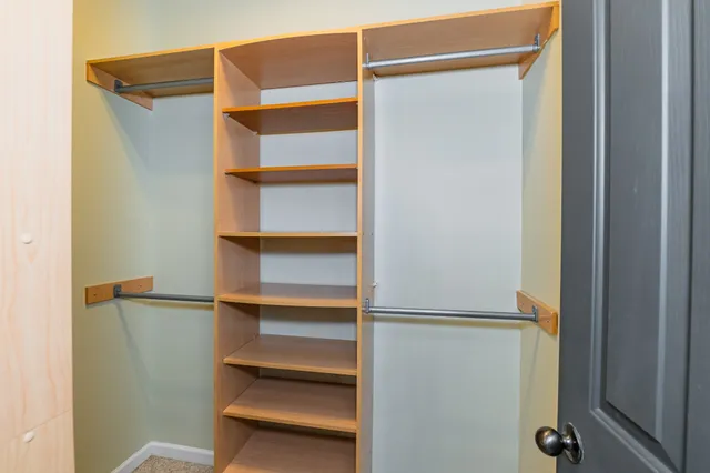 a bathroom with a shower and a bath tub