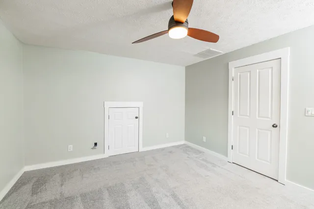 a room with a desk and chair