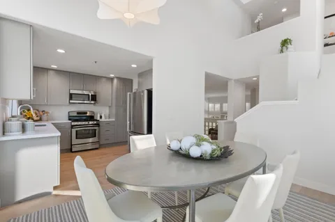 a room with a table and chairs
