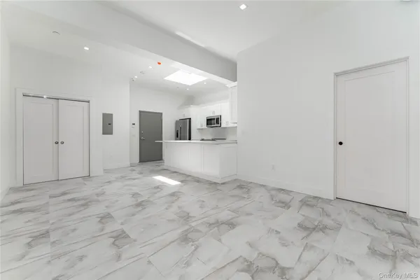 a view of a kitchen with a sink