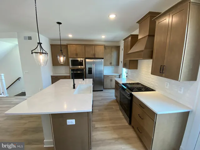 a view of hallway with livingroom