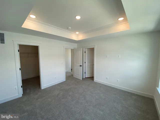 an empty room with a bench