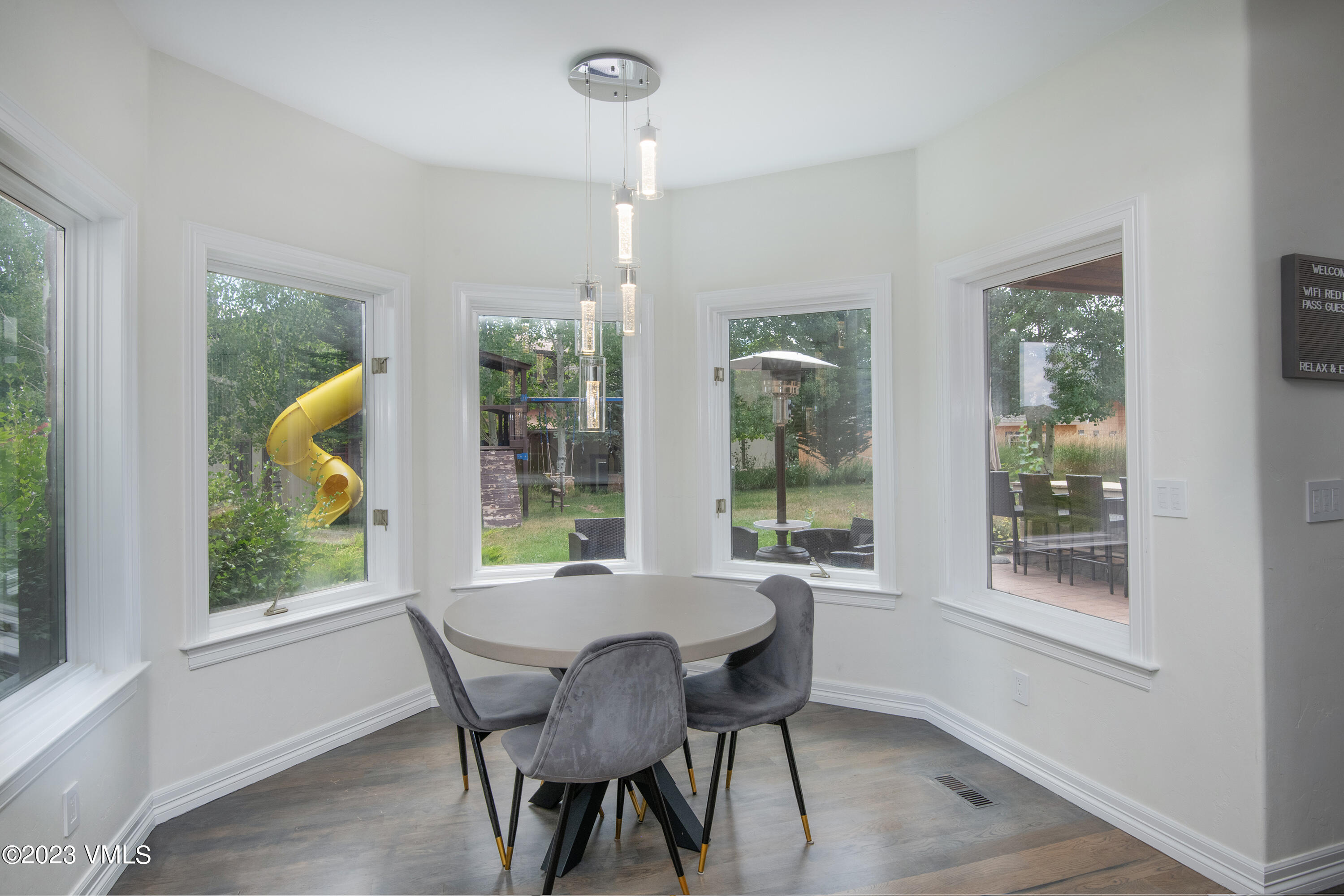 305 Red Fox Gypsum, CO 81637 - Photo 18 of 50 a dining room with furniture and a window