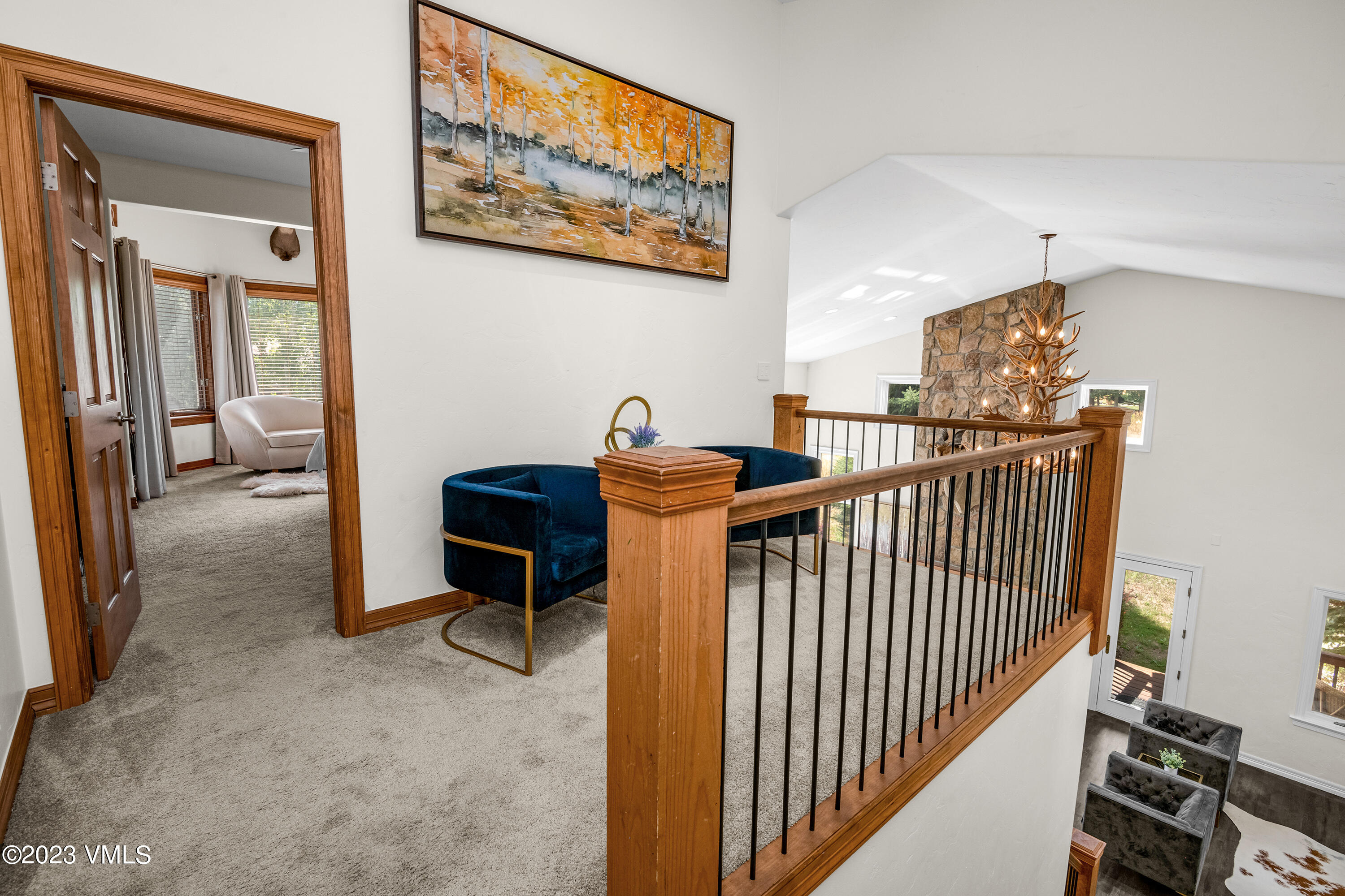 305 Red Fox Gypsum, CO 81637 - Photo 20 of 50 a balcony with furniture and wooden floor