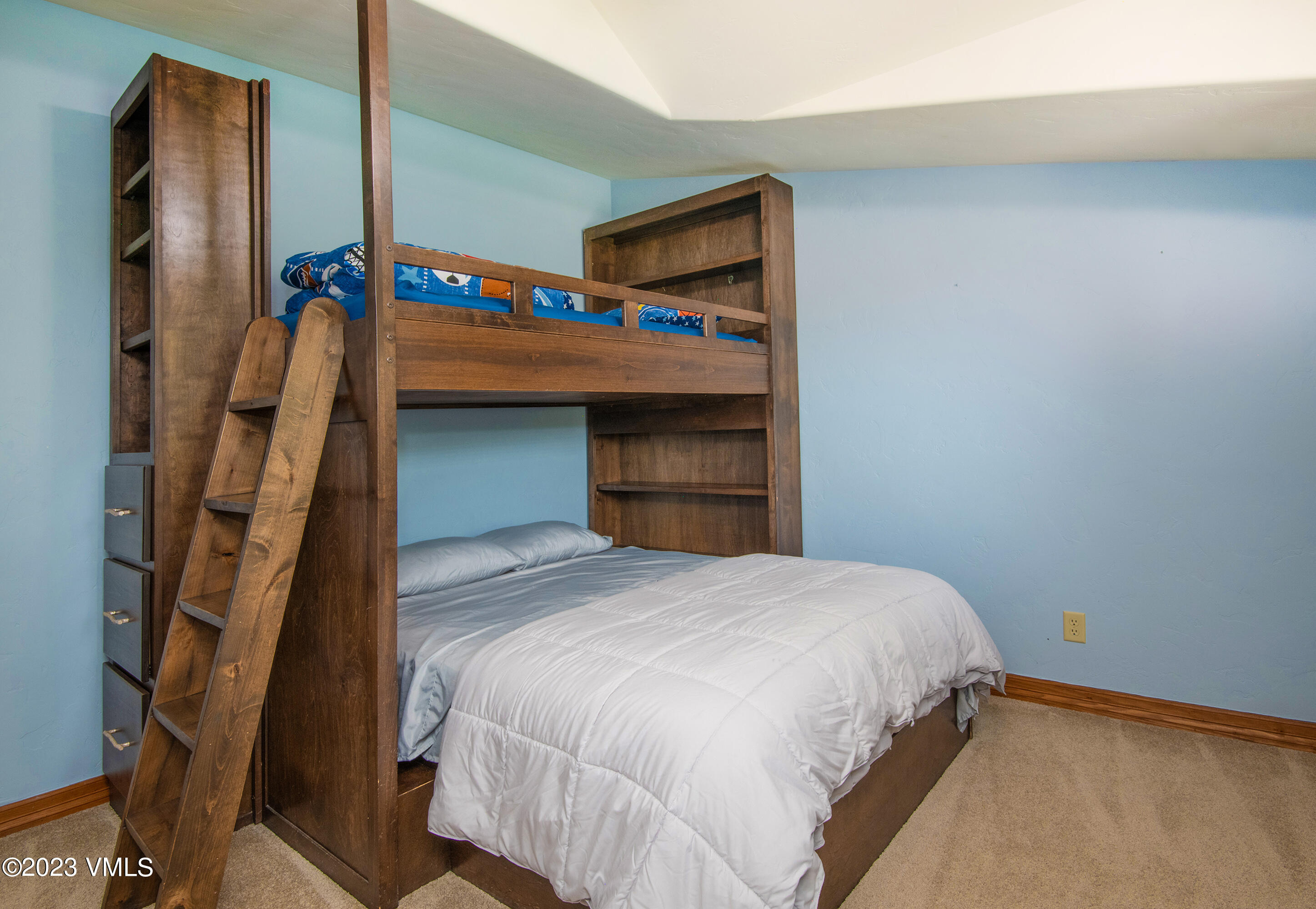 305 Red Fox Gypsum, CO 81637 - Photo 26 of 50 a bedroom with a bed and a window