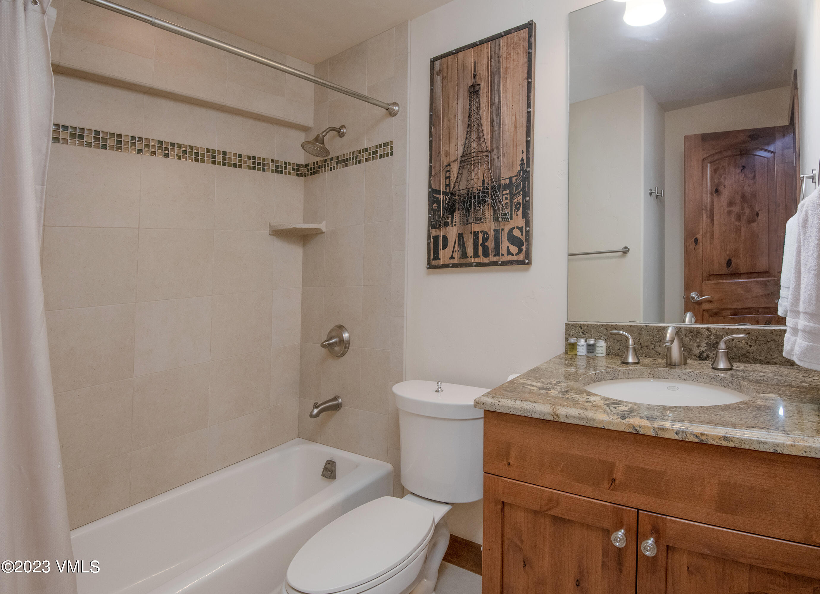 305 Red Fox Gypsum, CO 81637 - Photo 35 of 50 a bathroom with a granite countertop sink toilet and shower