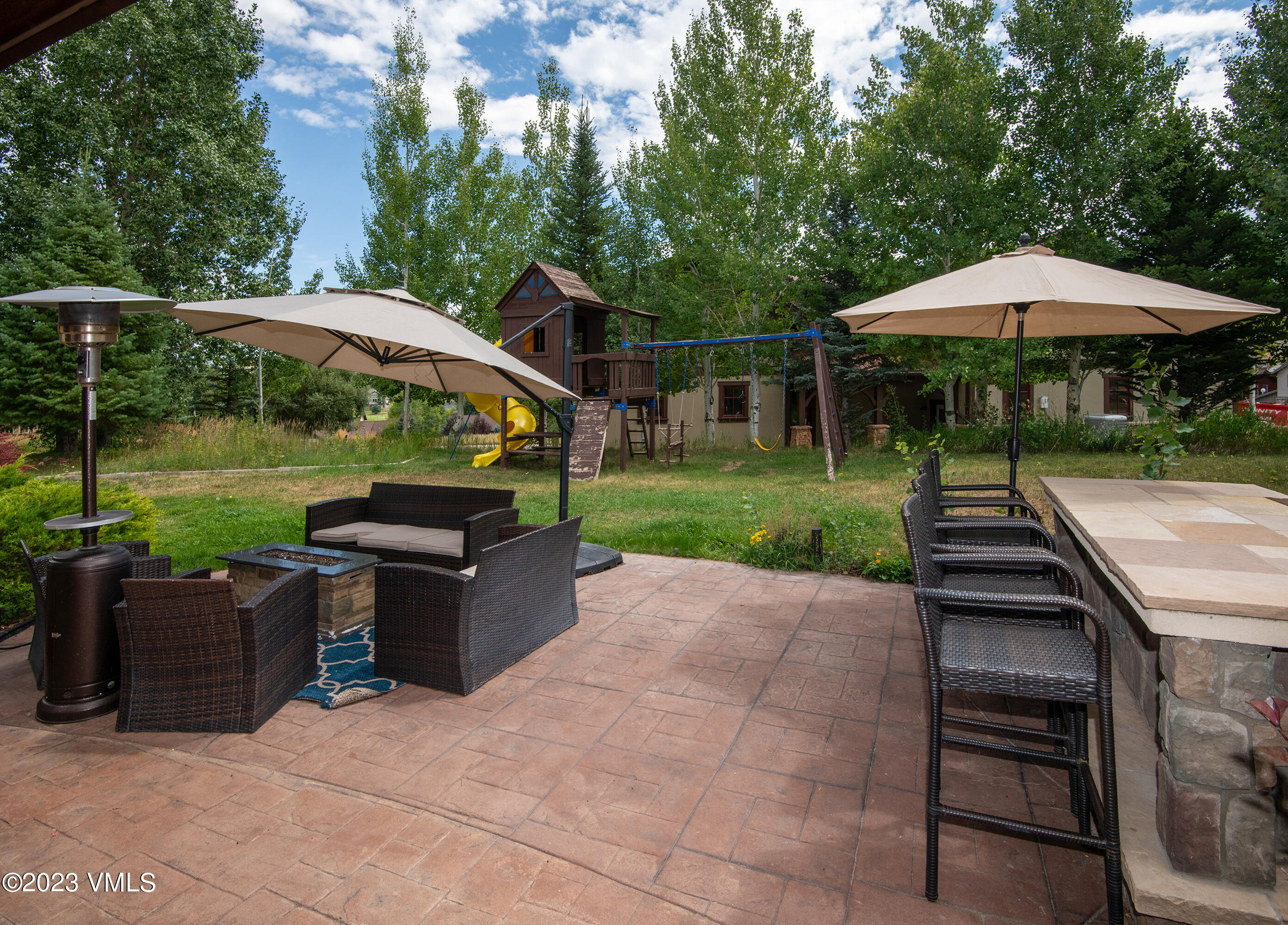 305 Red Fox Gypsum, CO 81637 - Photo 36 of 50 a view of outdoor space yard deck patio and outdoor kitchen