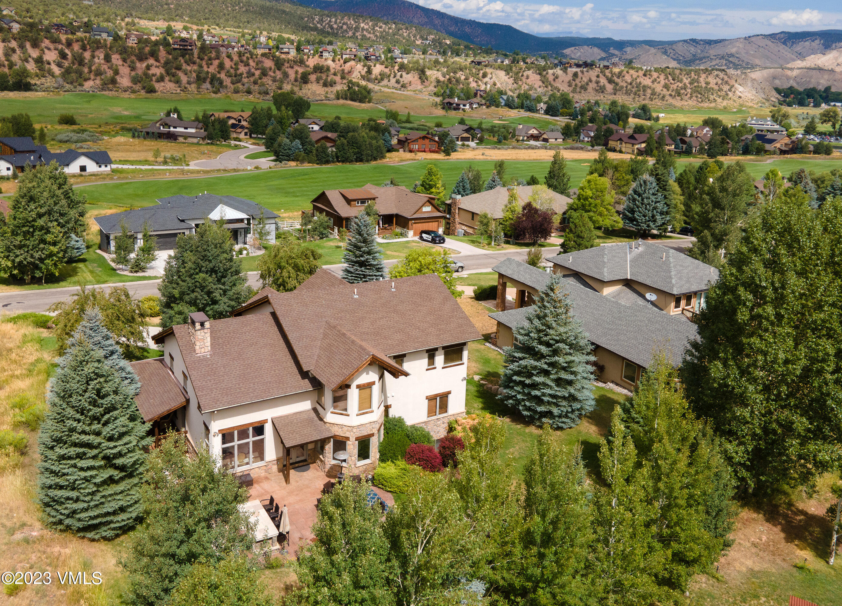 305 Red Fox Gypsum, CO 81637 - Photo 48 of 50 an aerial view of a house with a garden and lake view