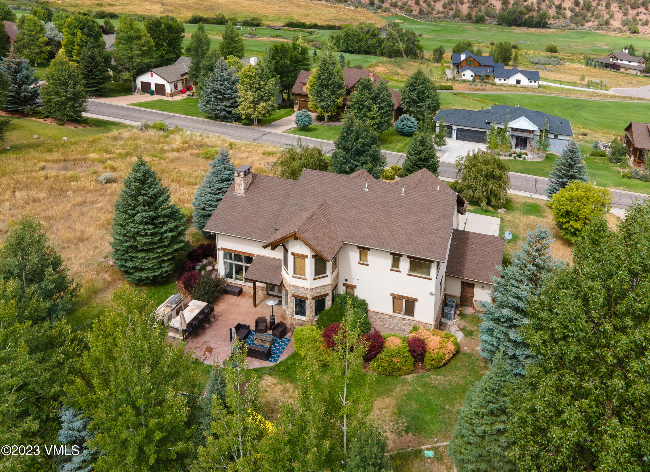 305 Red Fox Gypsum, CO 81637 - Photo 50 of 50 an aerial view of a house with a garden and lake view