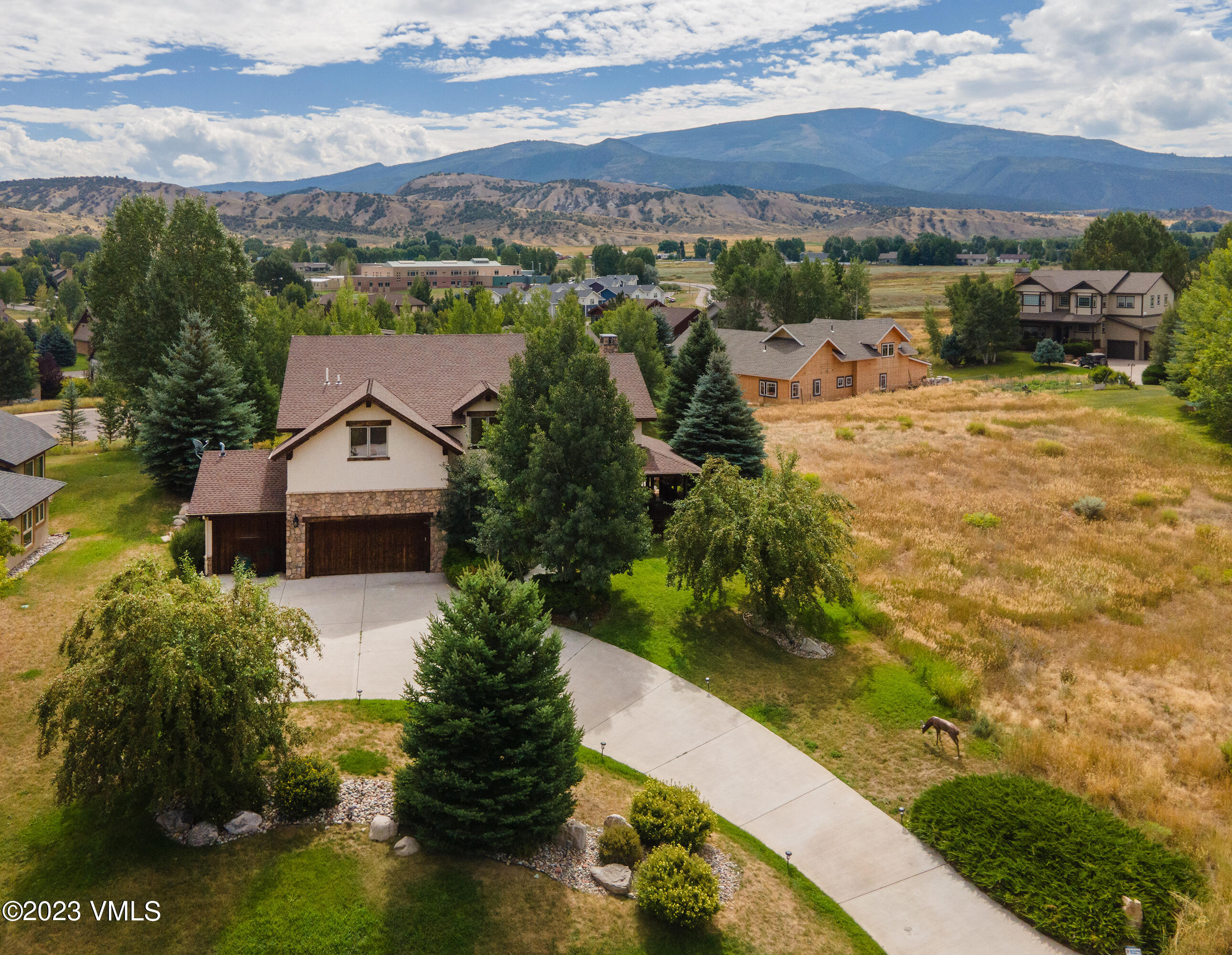 305 Red Fox Gypsum, CO 81637 - Photo 5 of 50 a view of a house with a yard