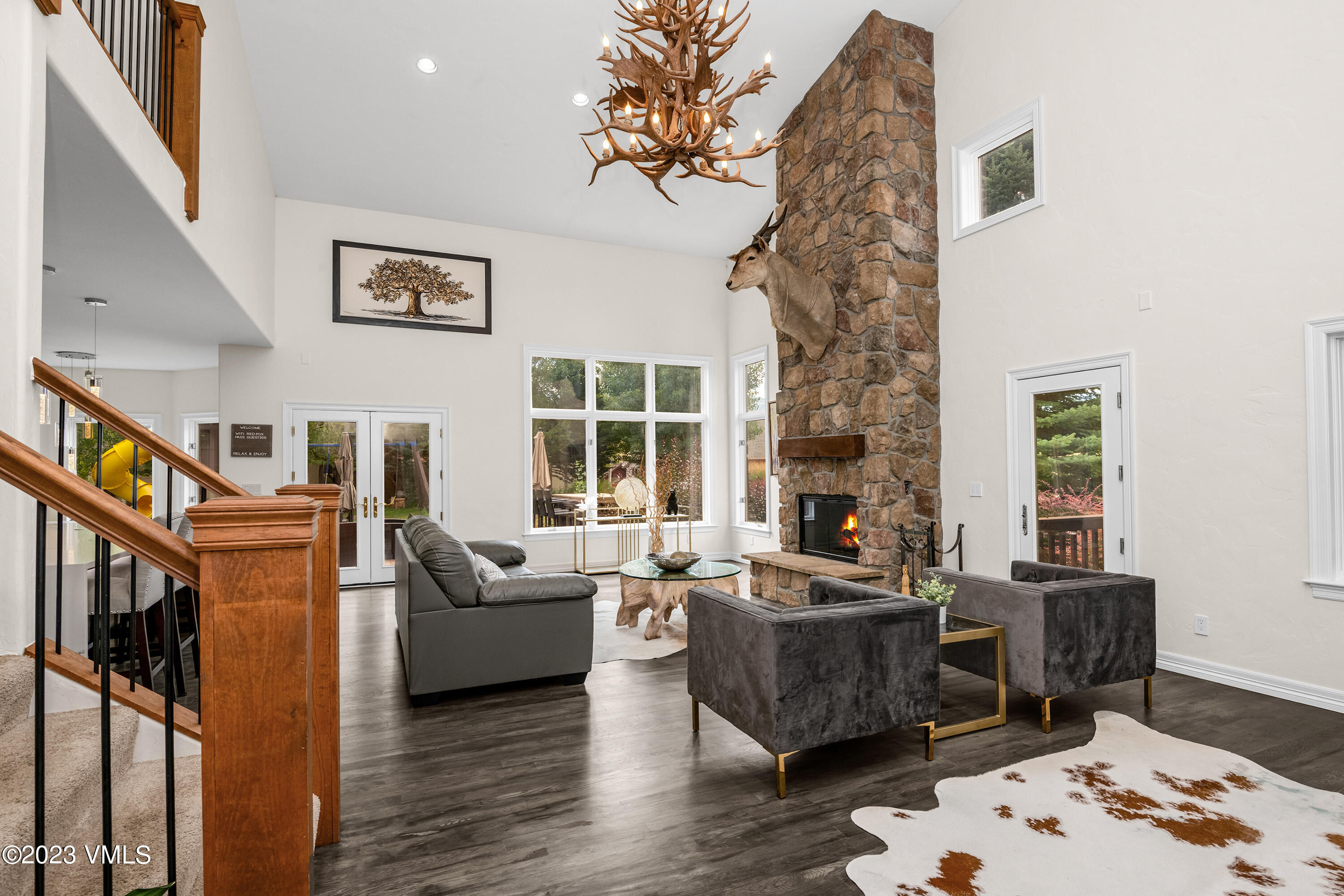 305 Red Fox Gypsum, CO 81637 - Photo 6 of 50 a living room with furniture and a fireplace