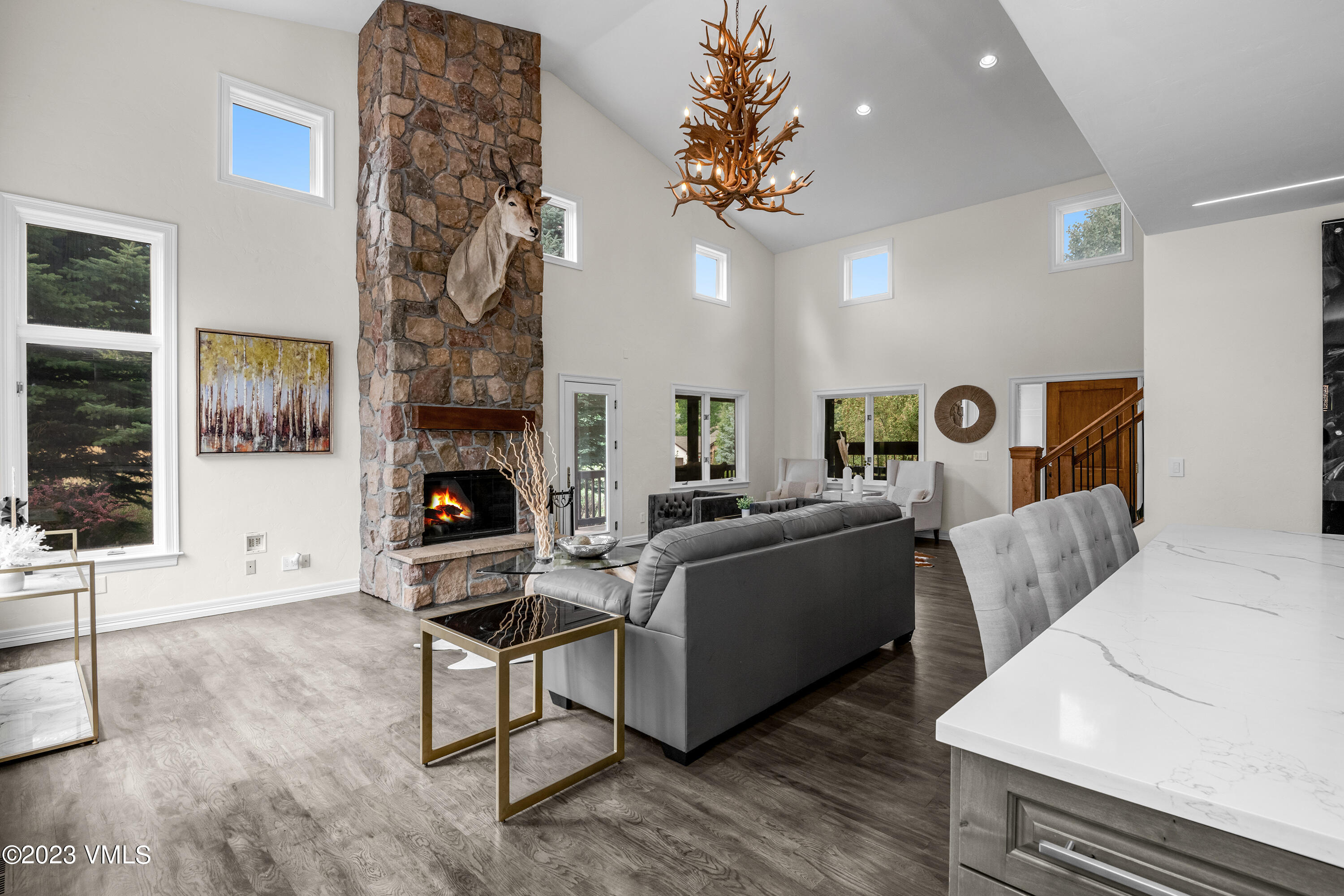 305 Red Fox Gypsum, CO 81637 - Photo 9 of 50 a living room with furniture and a fireplace