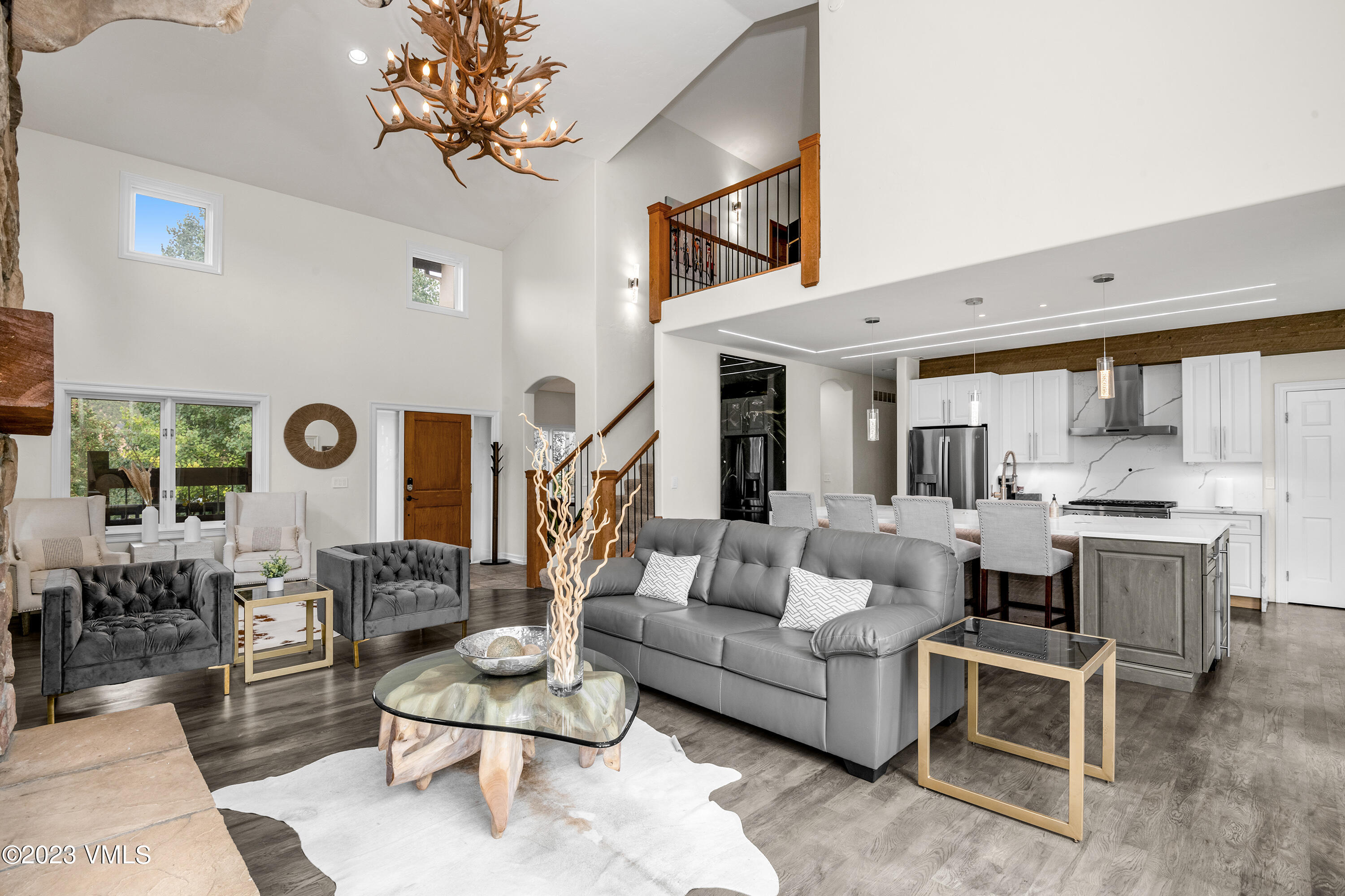 305 Red Fox Gypsum, CO 81637 - Photo 10 of 50 a living room with furniture and a large window