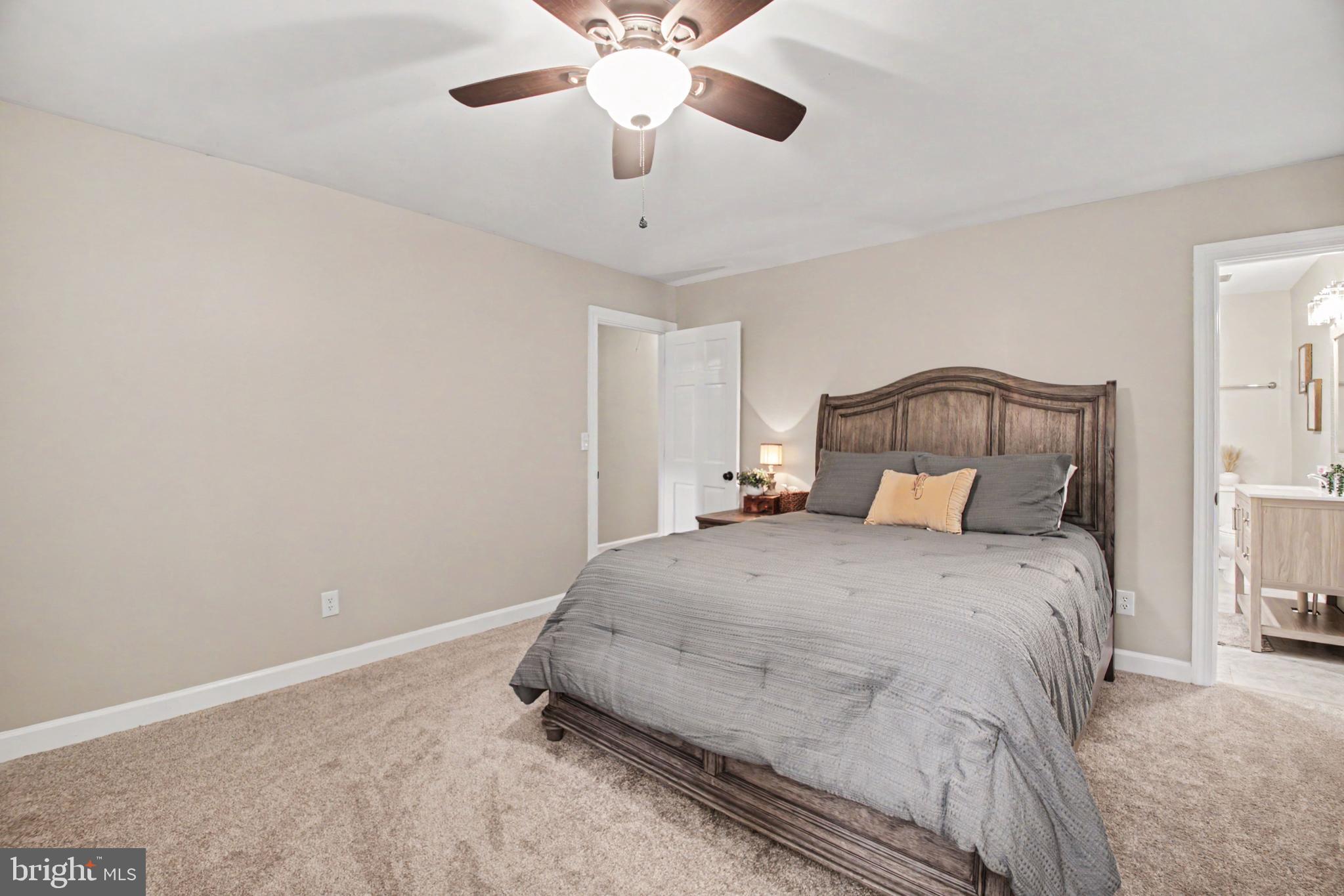 10224 Mill Pond Road Spotsylvania, VA 22551 - Photo 16 of 52 Primary Bed w/UPDATED Carpet & Ceiling Fan w/Light