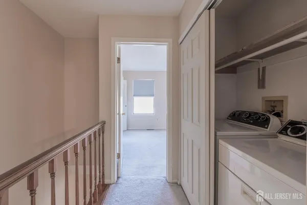 a utility room with a washer and dryer